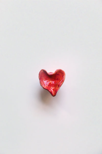 Ceramic knob, orange red heart